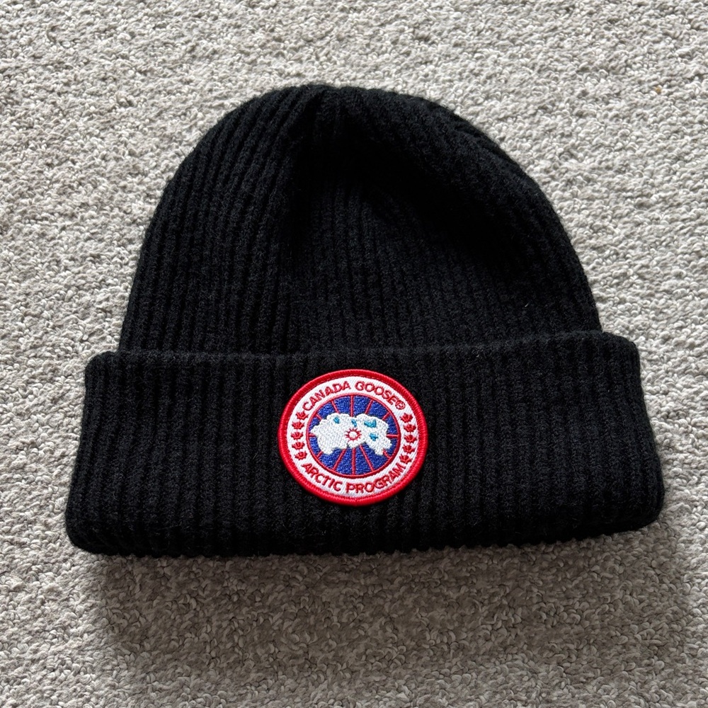 Canada Goose Black Ribbed Beanie with Red & White Logo Patch